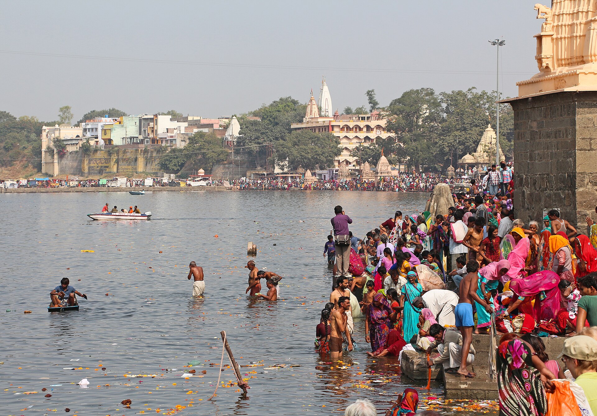 Ram Ghat at Ujjain with devotees taking a holy dip in the Kshipra River at dawn