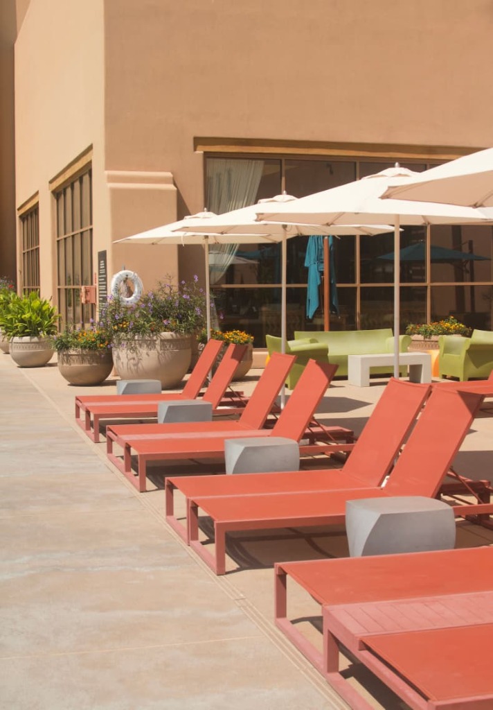 Luxurious outdoor pool loungers and resort amenities